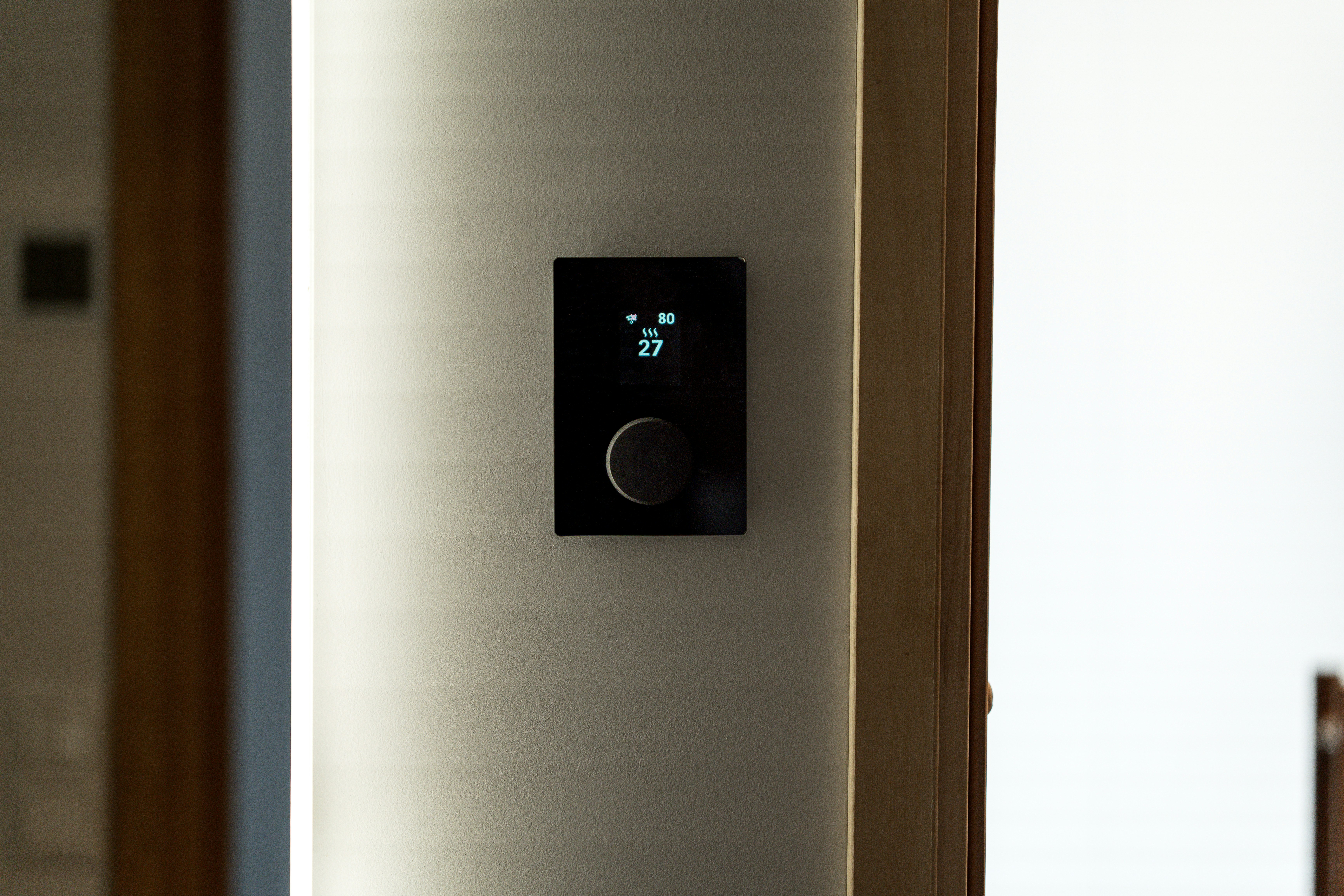 Thermostat detail for seasonal HVAC preparation guidance